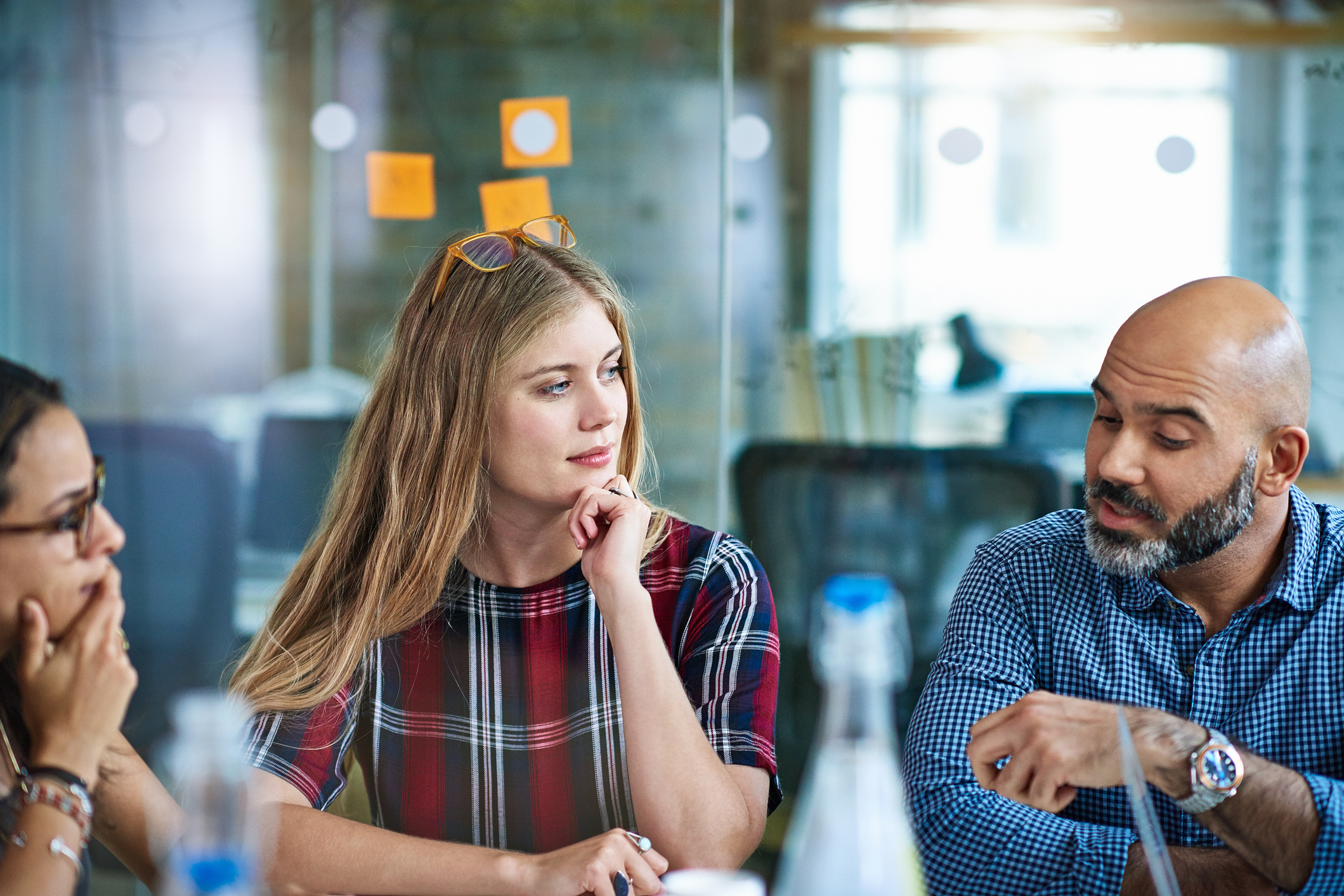 A diverse group of individuals focussed on a coversation